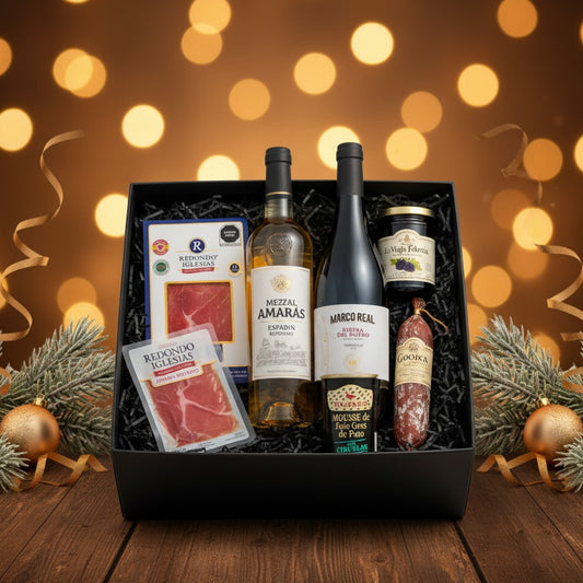 Caja gourmet premium Sabores de Temporada con mezcal, vino y jamón serrano, regalo corporativo de fin de año